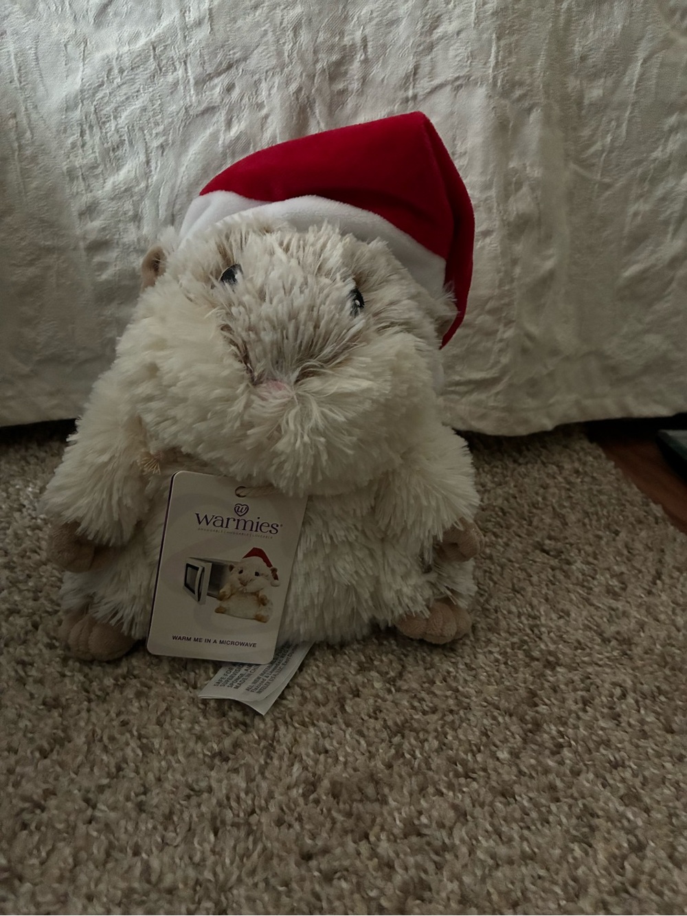 NWT - WarmIes Plush Cream Hedgehog with Red Santa Hat